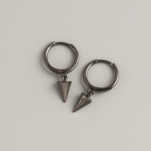 Detailed view of gunmetal geometric hoop earrings featuring a minimalist cone charm