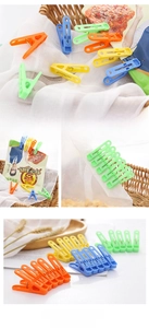 Close-up of colorful plastic laundry pegs with metal springs used for snack bag sealing