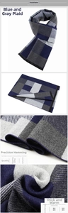 Close-up of blue and gray checkered winter scarf showing thick fabric and precise edge stitching