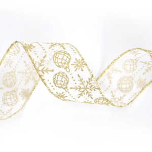 Détail du ruban de Noël en maille blanche avec flocons et boules dorés pailletés