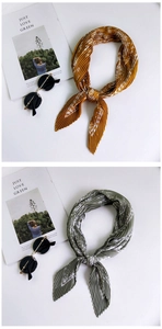 Detailed texture of pleated silk scarf in mustard yellow and olive green colors