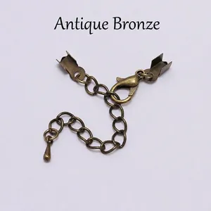 Antique bronze jewelry finding set with lobster clasp and extension chain detail