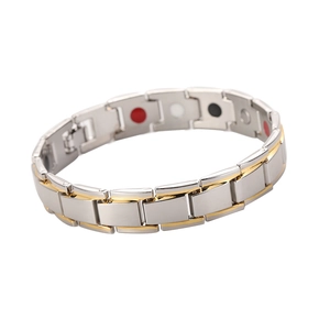 Men's titanium magnetic therapy bracelet with gold and silver links on white background
