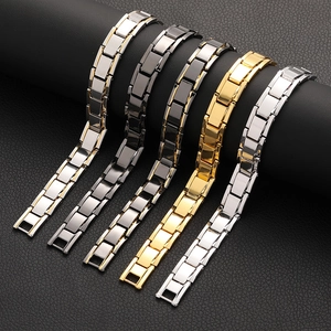 Detailed close-up of titanium steel magnetic therapy bracelets in five assorted colors