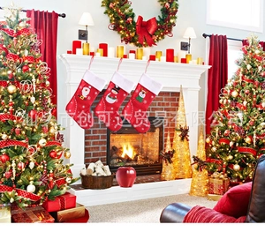 Three red felt Christmas stockings with Santa, snowman and elk hung on a festive fireplace