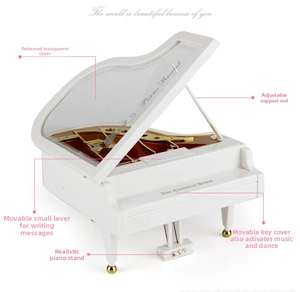 White mini piano music box featuring transparent lid and functional message writing area