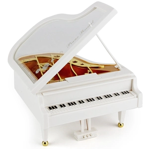 Elegant white grand piano music box with realistic keys and internal mechanical detail