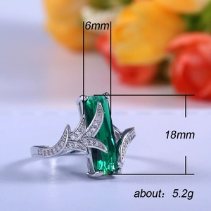 Rainbow gemstone ring with emerald cut green zircon and leaf detail, weight 5.2g