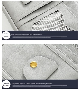 Detail of gray PU leather car visor organizer with precise stitching and metal buckle clip