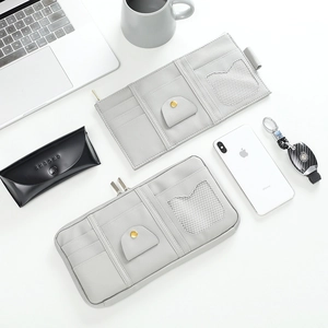 Gray PU leather car sun visor organizer with multiple card slots and mesh pocket