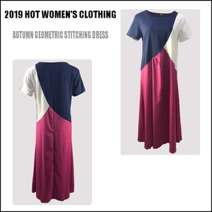 Detailweergave van geometrische patchwork maxi-jurk in marineblauw, wit en rozerood