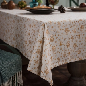 Linen Christmas tablecloth with golden bells and snowflake patterns for festive dining