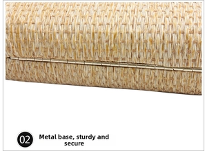 Macro shot of handmade straw clutch bag showing durable metal bottom hinge and tight weave