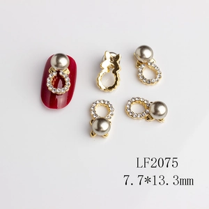 Detail of LF2075 gold metal nail charm with white crystals and grey pearl, 7.7x13.3mm