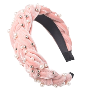 Detail of pink velvet braided headband with white pearls and silver beads decoration