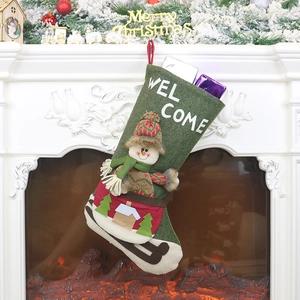 Green Christmas stocking with snowman decor and Welcome text on a festive fireplace
