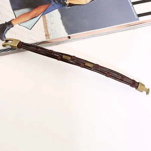 Multilayer brown leather bracelet with antique metal beads on a white background