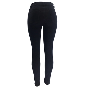 Rear view of high-waist slim fit black denim pants showing butt lift effect on mannequin