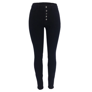 Close-up of high-waist black skinny jeans featuring a stylish five-button metal fly closure
