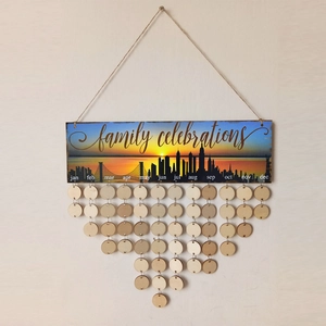 Detailed view of family celebrations wooden calendar plaque with blank tags for dates