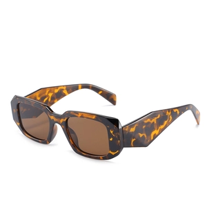 Retro geometric tortoiseshell sunglasses with brown lenses and wide acetate frames