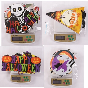 Detail view of weight measurements for Halloween pumpkin and skull banner party decorations