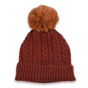 Deep brown cable knit beanie with a large fluffy pom-pom for winter warmth