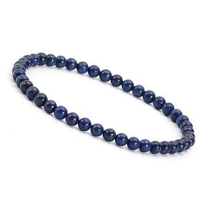 Detailed view of 4mm navy blue natural stone beads strung on an elastic bracelet