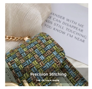 Macro shot of precise stitching on a tweed chain bag with leather patchwork and gold metal