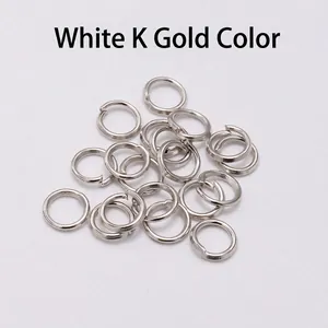 Detailed view of bulk silver tone open jump rings for DIY jewelry necklace assembly