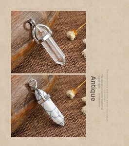 Detail of vintage crystal pendants with vivid texture and polished metal bails