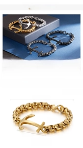 Detailed size chart and multi-color anchor bracelets in gold, black, and steel finish