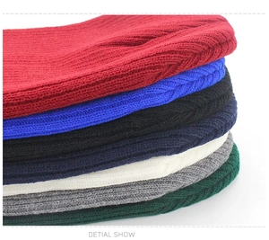 Detail showing various colors of ribbed knit beanies with premium texture and thick yarn