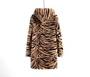 Detail view of the tiger print faux fur coat back texture and hood construction