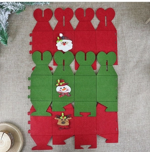 DIY Christmas felt gift bags featuring Santa, snowman, and reindeer flat layout