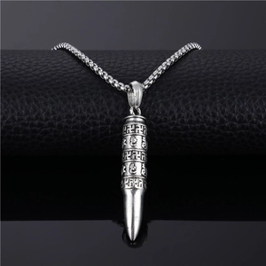 Vintage silver bullet pendant necklace in stainless steel with decorative engraving