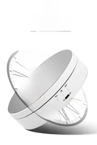 Detail view of electric rotating display stand with adjustable speed and charging port
