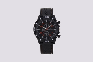 Close-up of black sports chronograph watch with silicone strap and orange stitching details