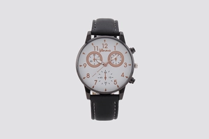 Detail of classic men's quartz watch with black leather strap and white dial