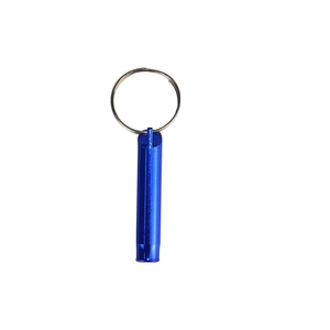 Close-up of blue aluminum survival whistle with metallic key ring on white background