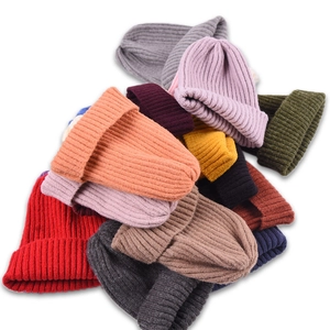 Classic ribbed knit beanie hats available in multiple colors for men and women