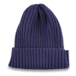 Detailed view of dark blue ribbed knit beanie showing textured wool blend material