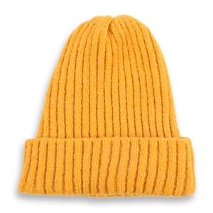 Detailed close-up of bright yellow ribbed knit beanie with cuffed design for winter