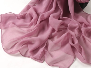 Detailed texture of pink purple chiffon shawl scarf with soft natural fabric draping