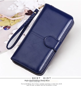 Deep blue long wallet for women with wrist strap and polished metal zipper detail
