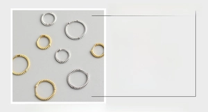 Detail view of S925 sterling silver twist hoop earrings with size and material specifications