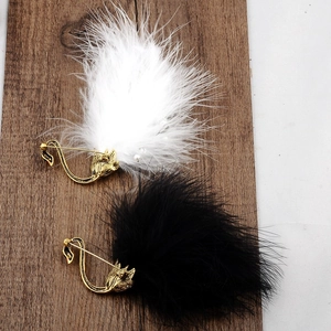 Vintage swan brooches with black and white ostrich feathers and gold metal base
