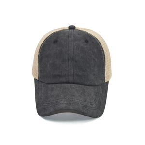 Detail of washed cotton grey baseball cap with beige mesh back and adjustable snapback