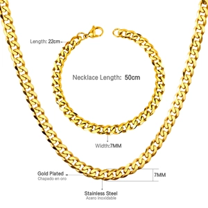 Detail of 7mm gold plated stainless steel Cuban link chain necklace and bracelet set