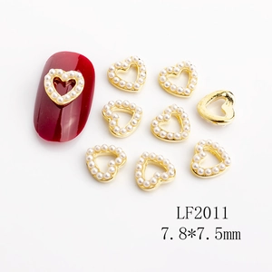 Hollow heart nail charms with gold metal base and pearls for Valentine's nail art